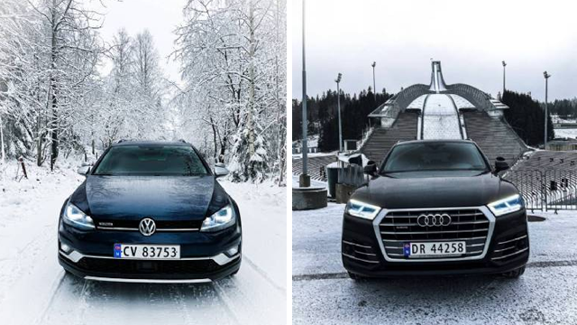 To biler i vinterlandskap, en svart Volkswagen og en svart Audi, med snødekte trær i bakgrunnen.