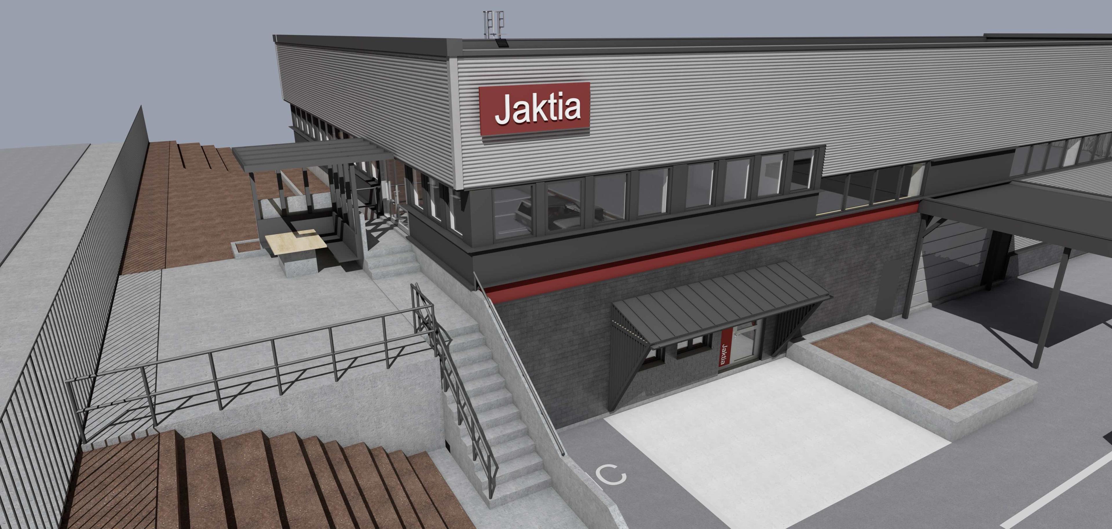 Moderne bygning med Jaklia-skjold, uteområde med trapper og sitteplasser.