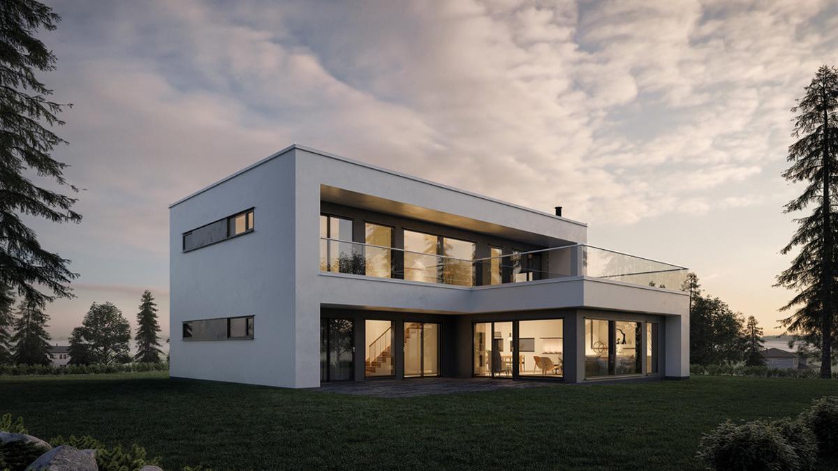 Moderne hus med store vinduer og balkong, omgitt av grønne trær under en skyet himmel.