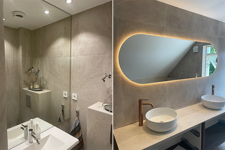 Moderne bad med lys beige fliser, stilige servantboller og et ovalt speil med LED-belysning.
