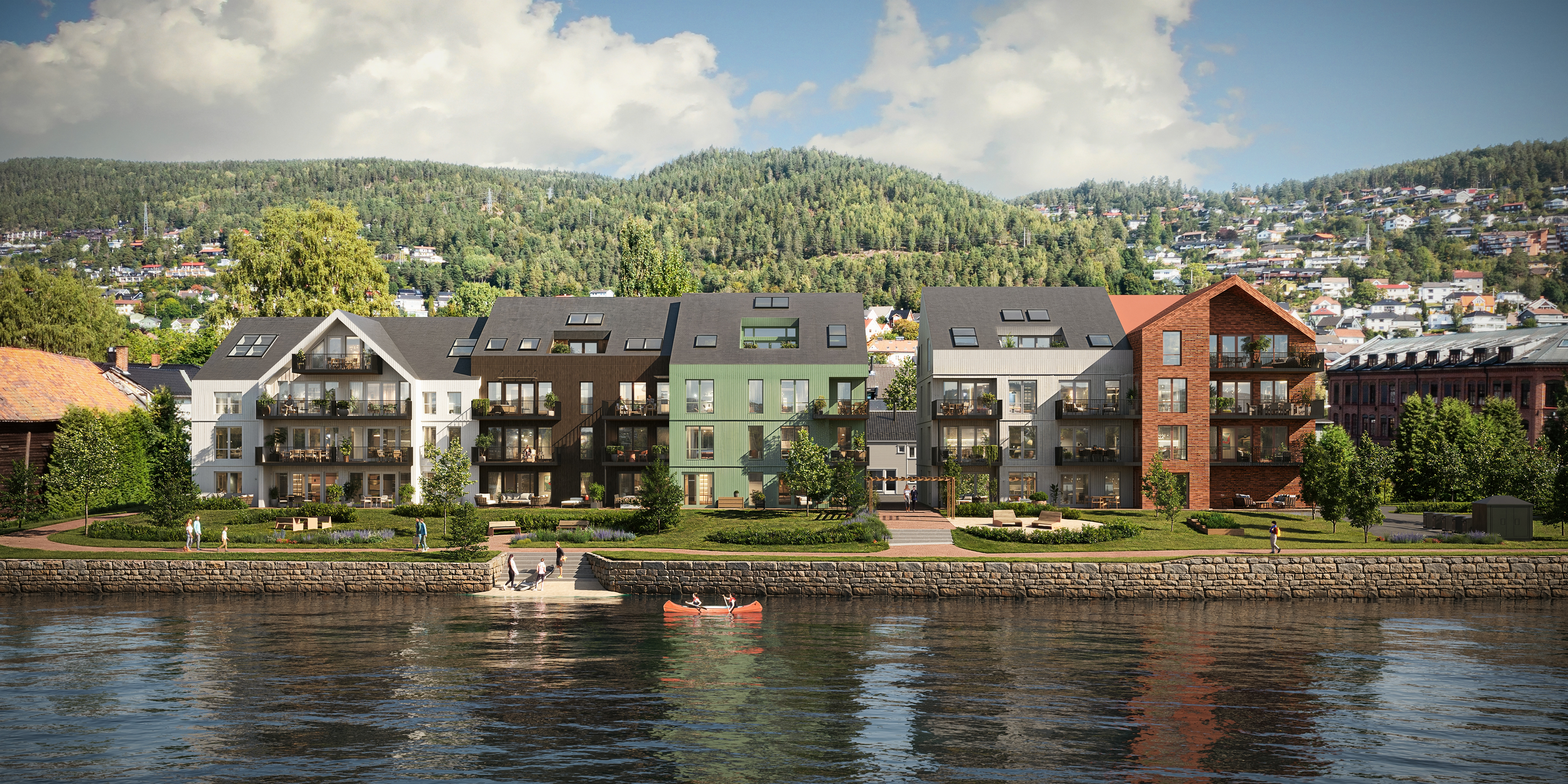 Moderne leilighetskompleks ved vannkanten med grønne åser i bakgrunnen og båter i nærheten.