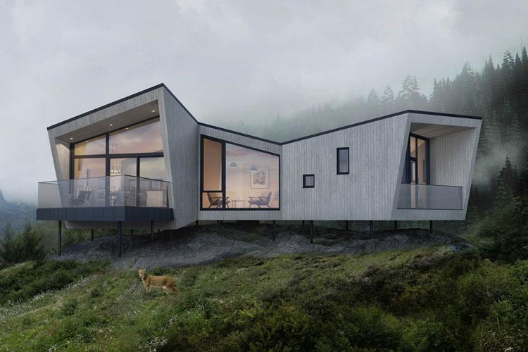 Moderne hus med skrå tak og store vinduer, plassert på en høyde med skog i bakgrunnen.