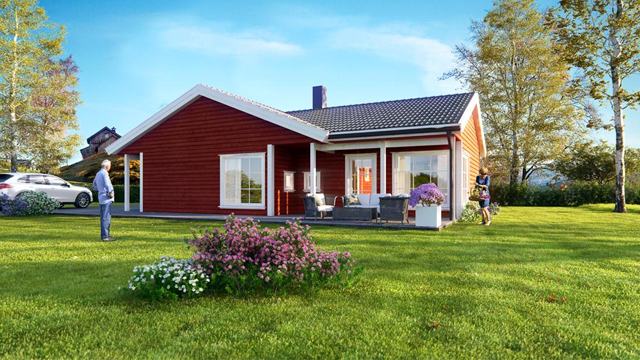 Moderne rød enebolig med hage, blomsterbed og personer som nyter utendørsområdet.