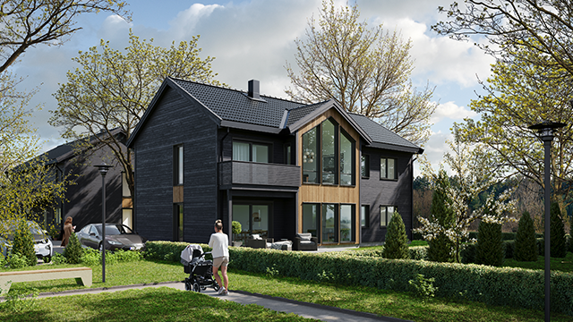Moderne enebolig med trepanel og store vinduer, omgitt av hage og trær, med en person som går med barnevogn.