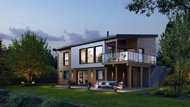Moderne hus med stor terrasse, grønne trær og en koselig hage i skumringen.