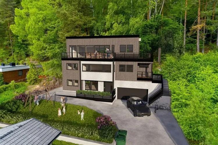 Moderne hus med tre etasjer, beliggende i en grønn hage med parkering foran og terrasse på toppen.