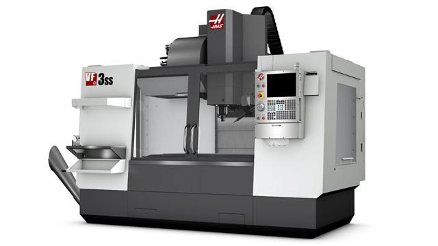 Haas UMC-3SS vertikal fresemaskin med moderne kontrollpanel og arbeidsområde for presisjonsbearbeiding.