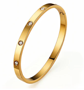 Elegant gullarmbånd med diamanter, perfekt for festlige anledninger eller hverdagsbruk.