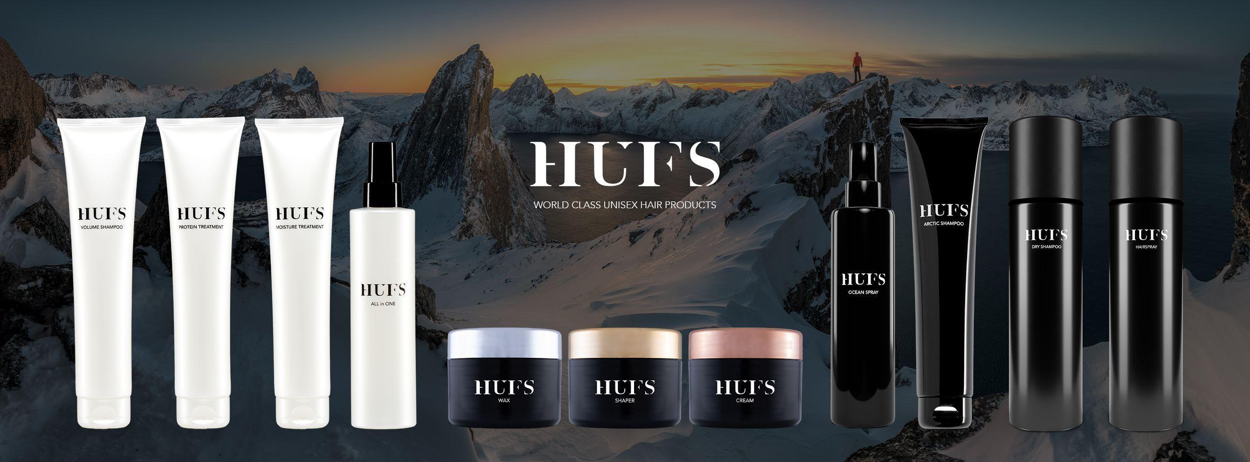Hudpleieprodukter fra HUTS med flere kremer og flasker på en snødekt fjellbakgrunn.