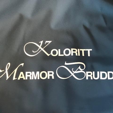 Koloritt Marmorbrudd AS logo